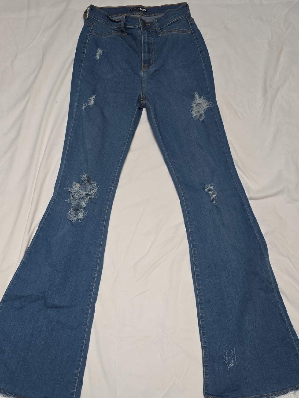 Fashion Nova Blue Distressed Flare Jeans